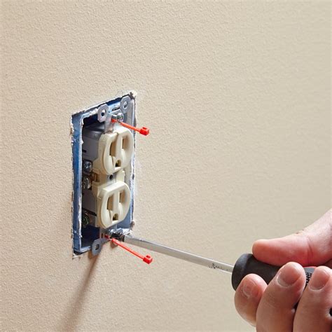 electrical outlet box screw hole